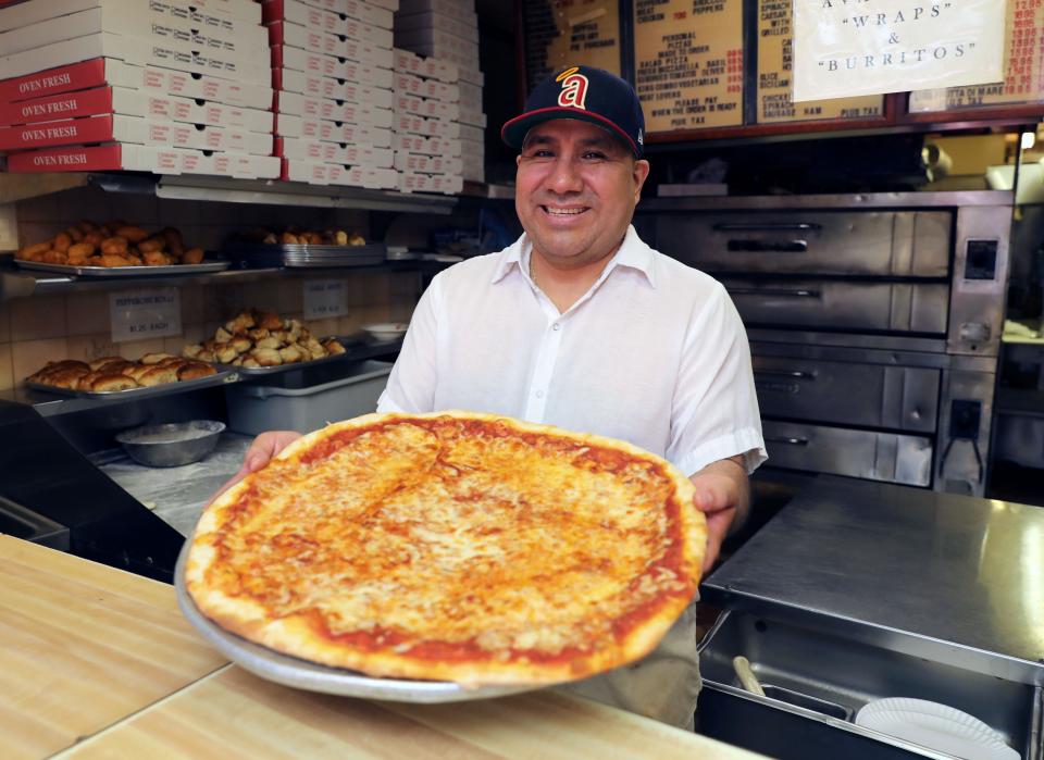 Lucino Mendez at the Pizza King Restaurant.