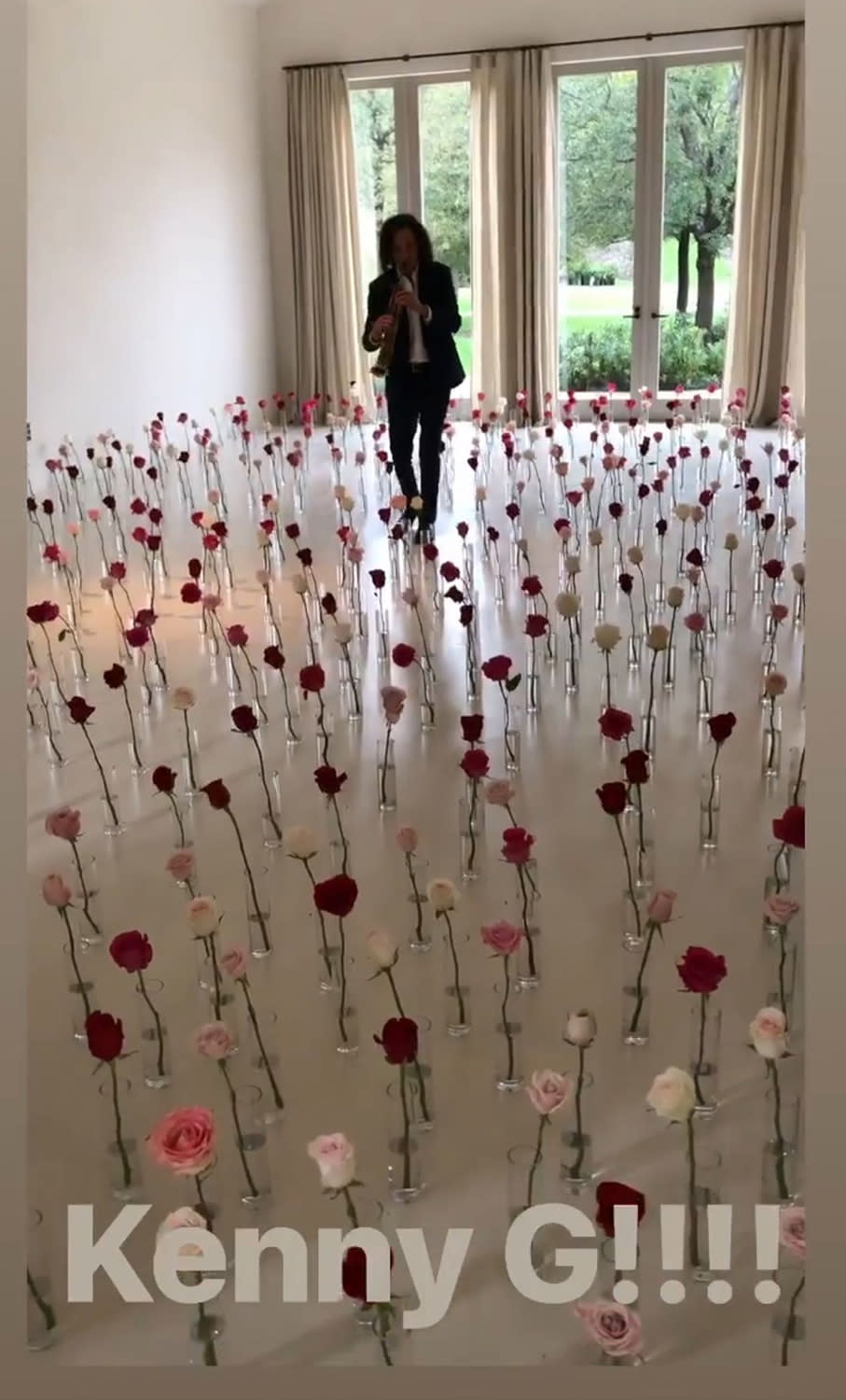 <p>And who could forget the time that Kardashian <a href="https://people.com/music/kenny-g-explains-valentines-day-surprise-kim-kardashian/" rel="nofollow noopener" target="_blank" data-ylk="slk:arrived home to find none other than famed saxaphonist Kenny G playing in her living room;elm:context_link;itc:0;sec:content-canvas" class="link ">arrived home to find none other than famed saxaphonist Kenny G playing in her living room</a>, surrounded by roses?</p> <p>To be honest, we're still wondering if he was standing there and <em>then </em>the flowers were arranged around him, or if he had to tip-toe into place. </p>