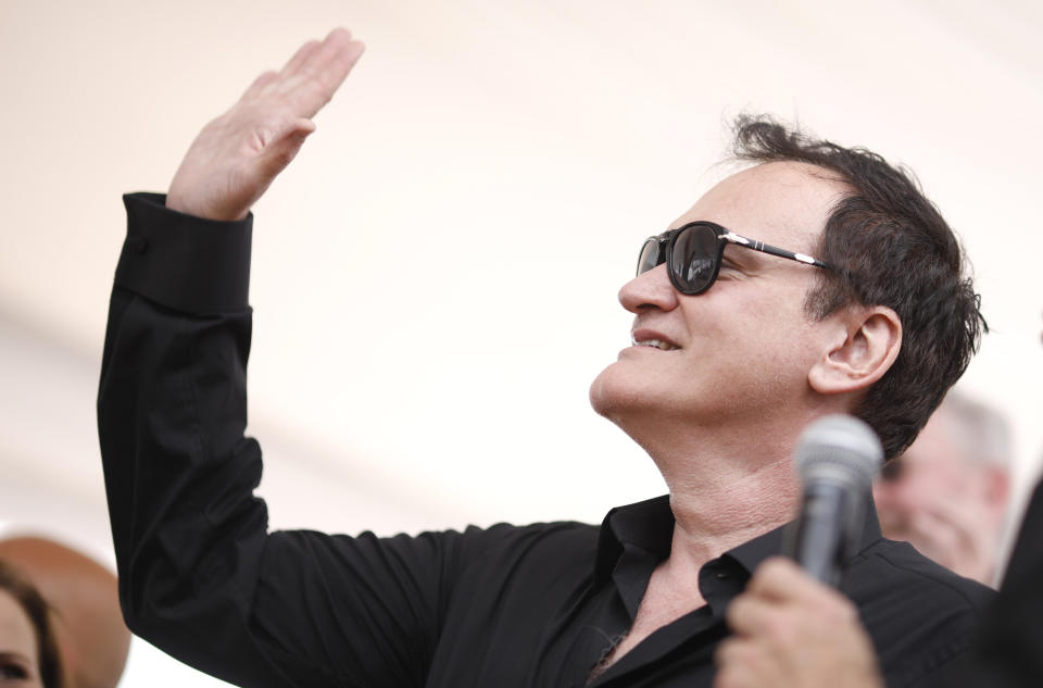 Director Quentin Tarantino poses for photographers at the photo call for the palm dog competition at the 72nd international film festival, Cannes, southern France, Friday, May 24, 2019. (AP Photo/Petros Giannakouris)