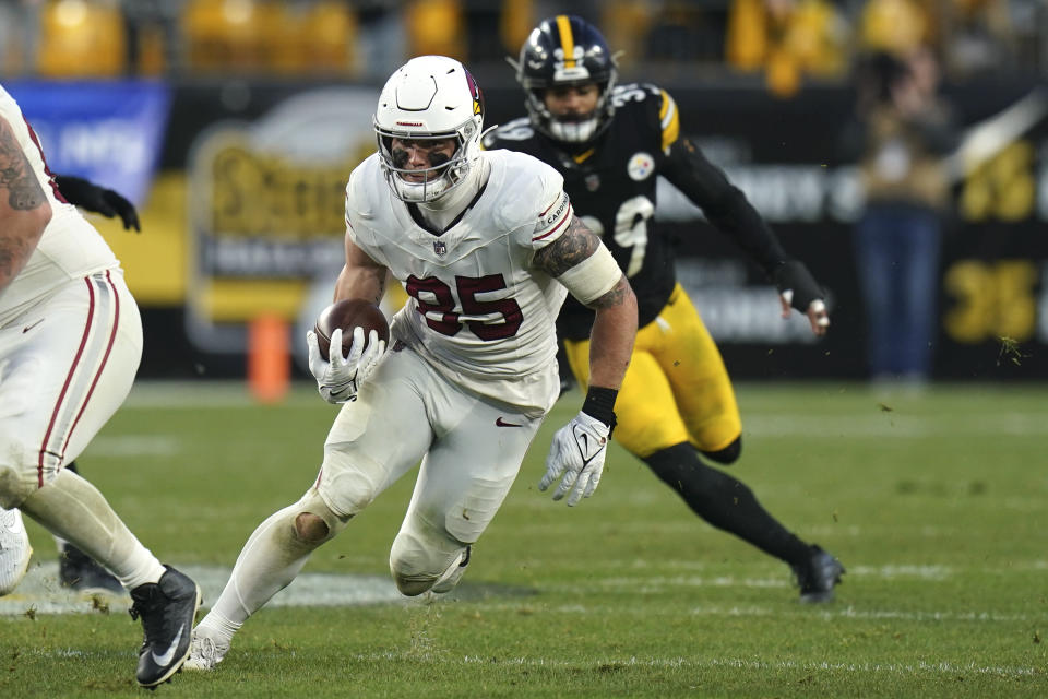 Arizona Cardinals tight end Trey McBride runs with the ball against the Pittsburgh Steelers during the second half of an NFL football game Sunday, Dec. 3, 2023, in Pittsburgh. The Cardinals won 24-10. (AP Photo/Matt Freed)