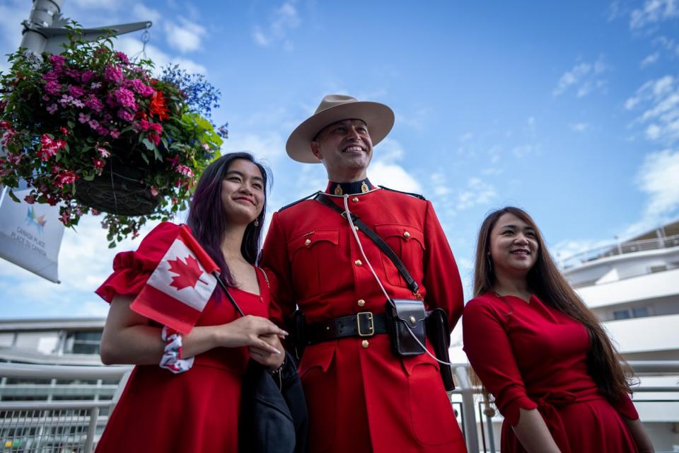 Photo Gallery: Canadians in a sea of red celebrate Canada Day at various events in cities and towns across the country.