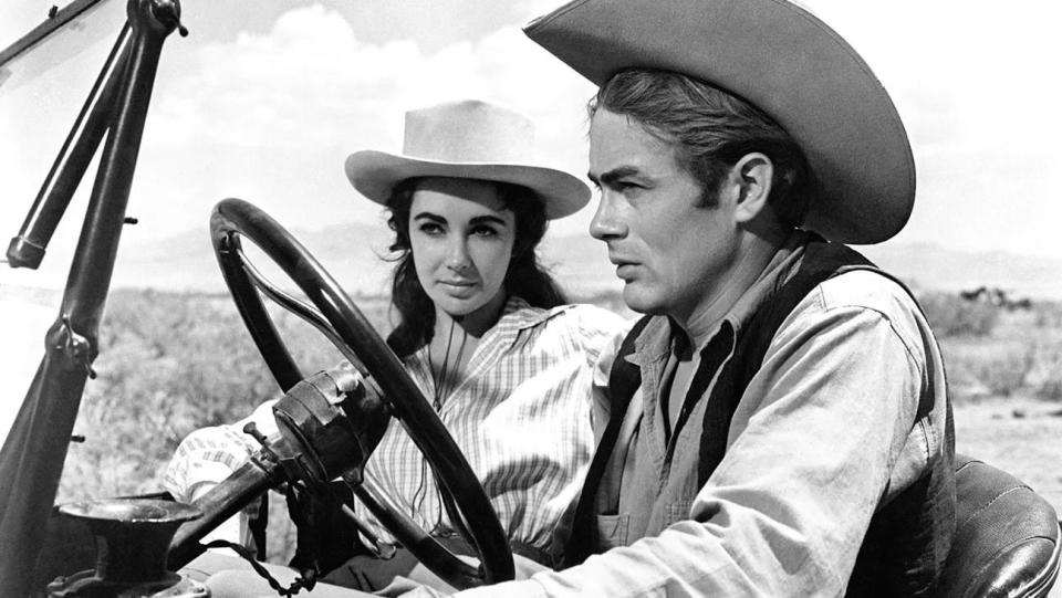 Elizabeth Taylor and James Dean star in the 1956 film "Giant."