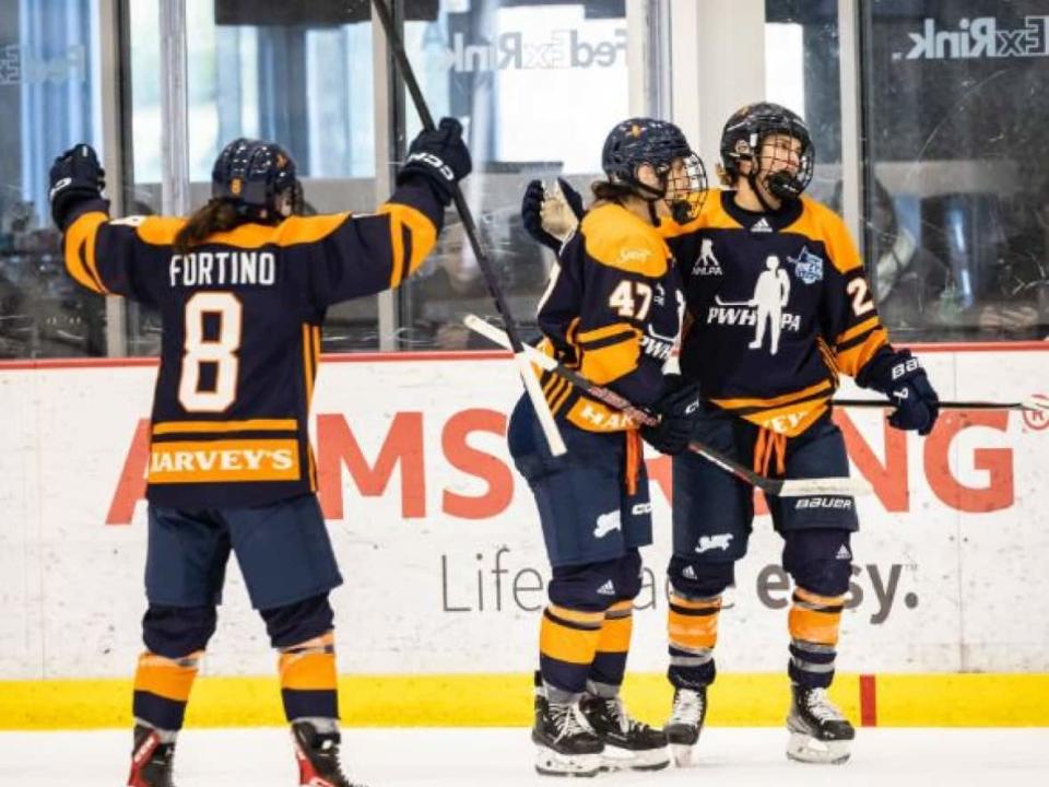 Team Harvey's players celebrate a goal during a 4-3 victory over Team Adidas at the  Professional Women's Hockey Players' Association's Dream Gap Tour showcase in Pittsburgh on Saturday. (@PWHPA/Twitter - image credit)