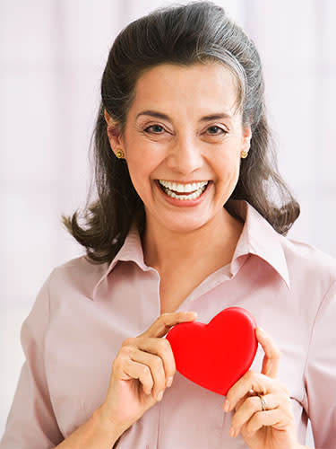 woman holding heart