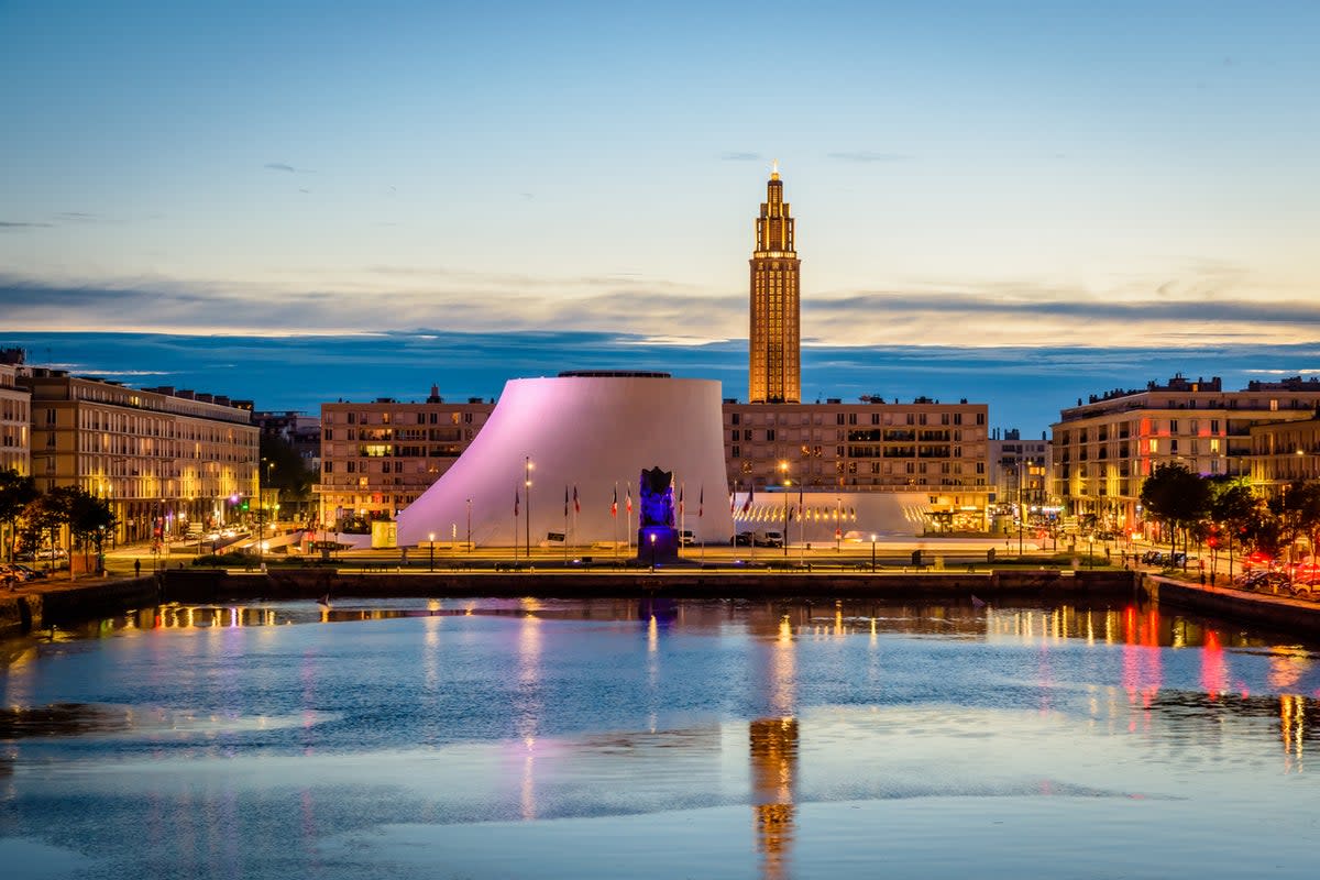 The Volcan theater and St Joseph’s Church at nightfall (Getty Images)