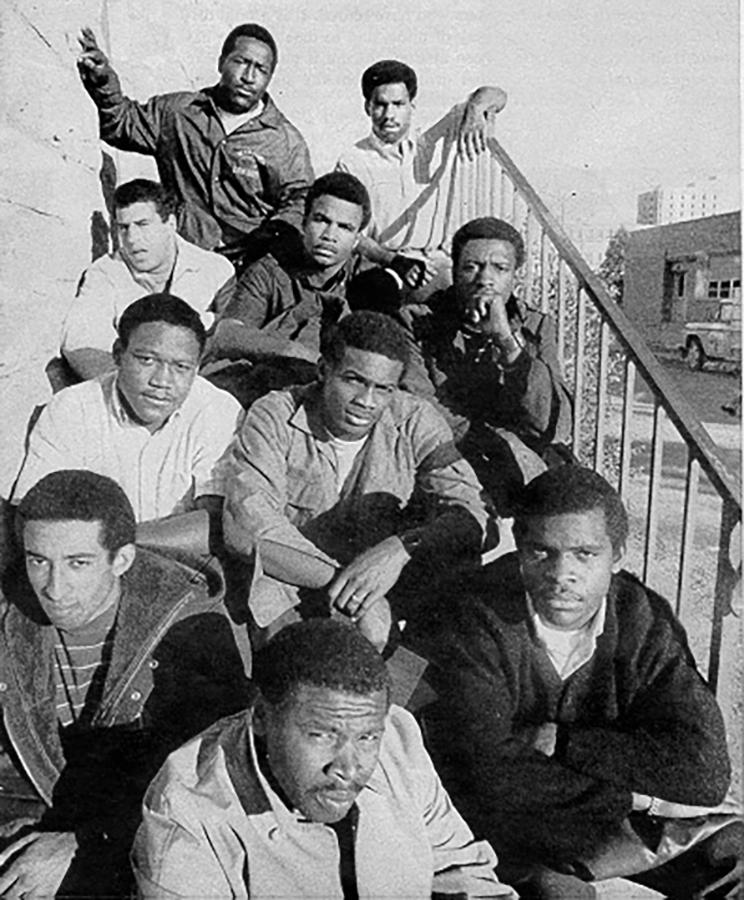 A 1969 photo provided by the University of Wyoming shows a group photo of 10 of the Black 14 at the University of Wyoming. Front center is Earl Lee; second row, John Griffin and Guillermo (Willie) Hysaw; third row Don Meadows and Ivie Moore; fourth row: Tony Gibson, Jerry Berry and Joe Williams; fifth row: Mel Hamilton and Jim Isaac. Not shown are Tony McGee, Ted Williams, Lionel Grimes and Ron Hill. The university is welcoming eight former football players back on campus half a century after a racist episode gutted their team. University officials plan to unveil a plaque commemorating the Black 14 athletes at War Memorial Stadium on Friday, Sept. 13, 2019. (University of Wyoming via AP)