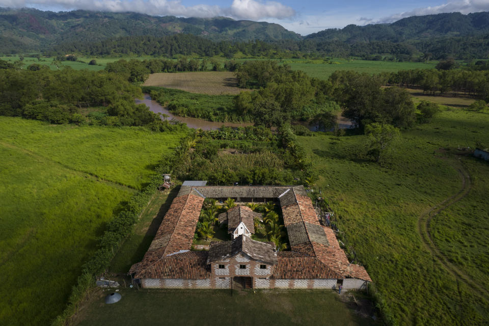 A bird's eye view shows the drug rehabilitation center run by Friar Leopoldo Serrano, in Mission San Francisco de Asis, Honduras, Tuesday, June 29, 2021. Serrano arrived here in 2009, after spiritual missions in New York and the Mosquitia region of Honduras. (AP Photo/Rodrigo Abd)