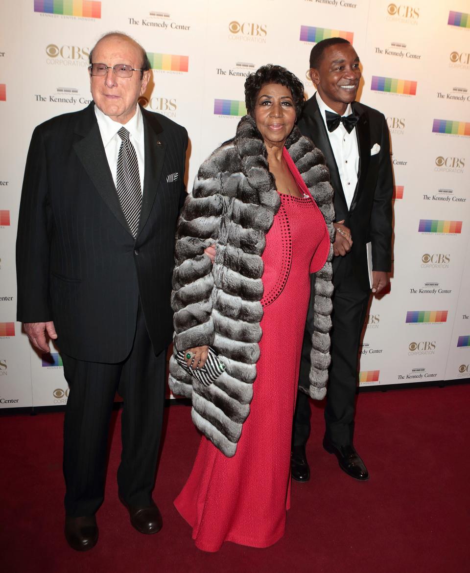 Clive Davis, left, escorted Aretha Franklin along with Isiah Thomas at the Kennedy Center Honors on Dec. 3, 2016.