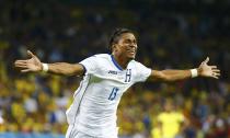 Carlo Costly of Honduras celebrates after scoring a goal during their 2014 World Cup Group E soccer match against Ecuador at the Baixada arena in Curitiba June 20, 2014. REUTERS/Stefano Rellandini (BRAZIL - Tags: SOCCER SPORT WORLD CUP)