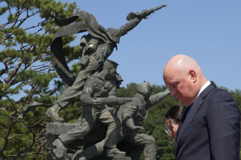 New Zealand's Prime Minister Christopher Luxon pays a silent tribute during a visit to National Cemetery in Seoul, South Korea, Wednesday, Sept. 4, 2024. (AP Photo/Ahn Young-joon)