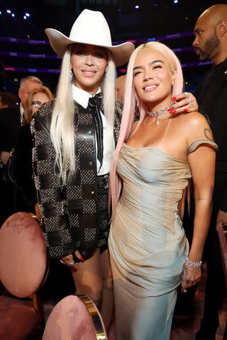 <p>Kevin Mazur/Getty</p> Beyoncé and Karol G