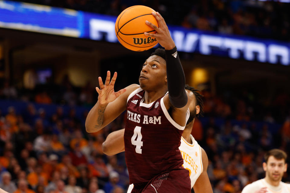 Mar 13, 2022; Tampa, FL; Texas A&M Aggies guard Wade Taylor IV (4) drives to the basket against the Tennessee Volunteers in the second half at Amelie Arena. Nathan Ray Seebeck-USA TODAY Sports