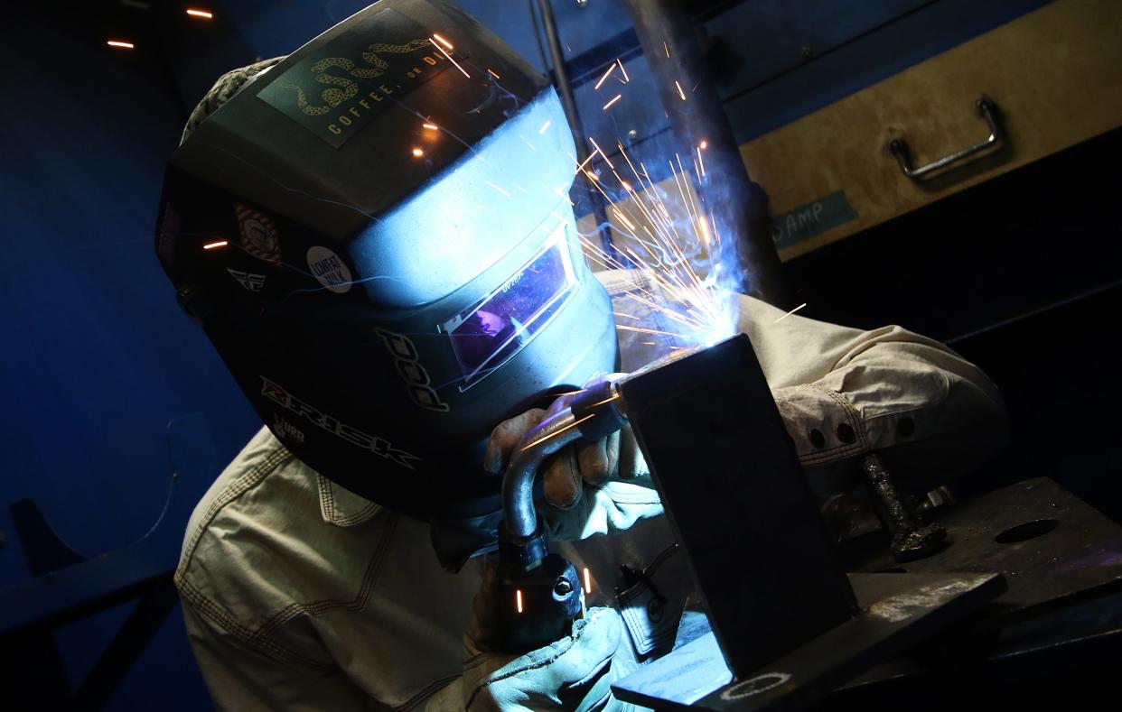 Crest student Jackson Pence works on his welding project during a welding competition held Friday, April 28, 2023, at Cleveland County Community College in Shelby.