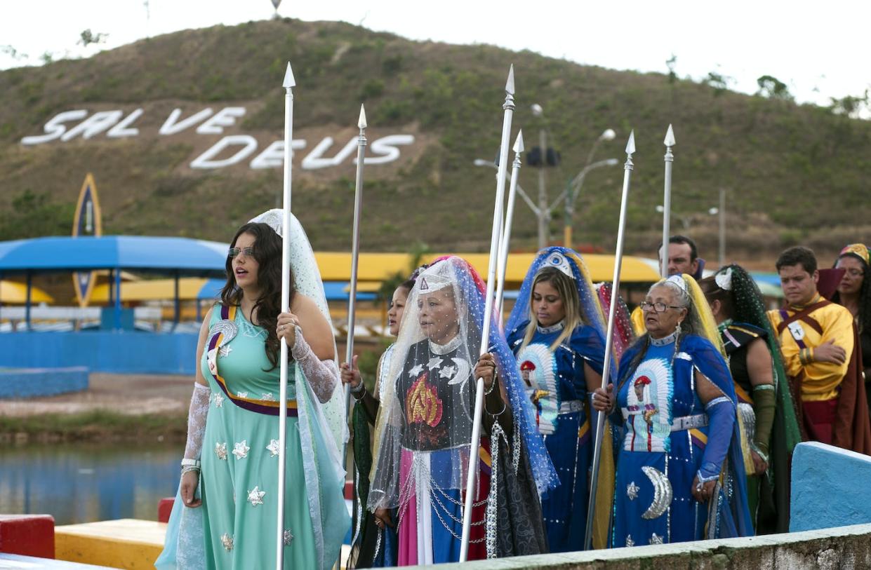 Valley of the Dawn members celebrate 'Day of the Indoctrinator' at their temple complex in Brazil on May 1. This year's event is postponed due to coronavirus. Márcia Alves, <a href="http://creativecommons.org/licenses/by-sa/4.0/" rel="nofollow noopener" target="_blank" data-ylk="slk:CC BY-SA;elm:context_link;itc:0;sec:content-canvas" class="link ">CC BY-SA</a>