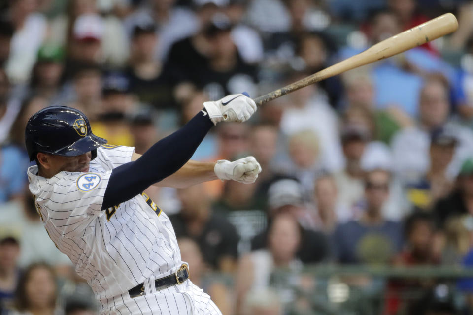 Milwaukee Brewers' Willy Adames loses control of his bat as he swings at a pitch during the third inning of a baseball game against the Chicago White Sox, Saturday, July 24, 2021, in Milwaukee. (AP Photo/Aaron Gash)