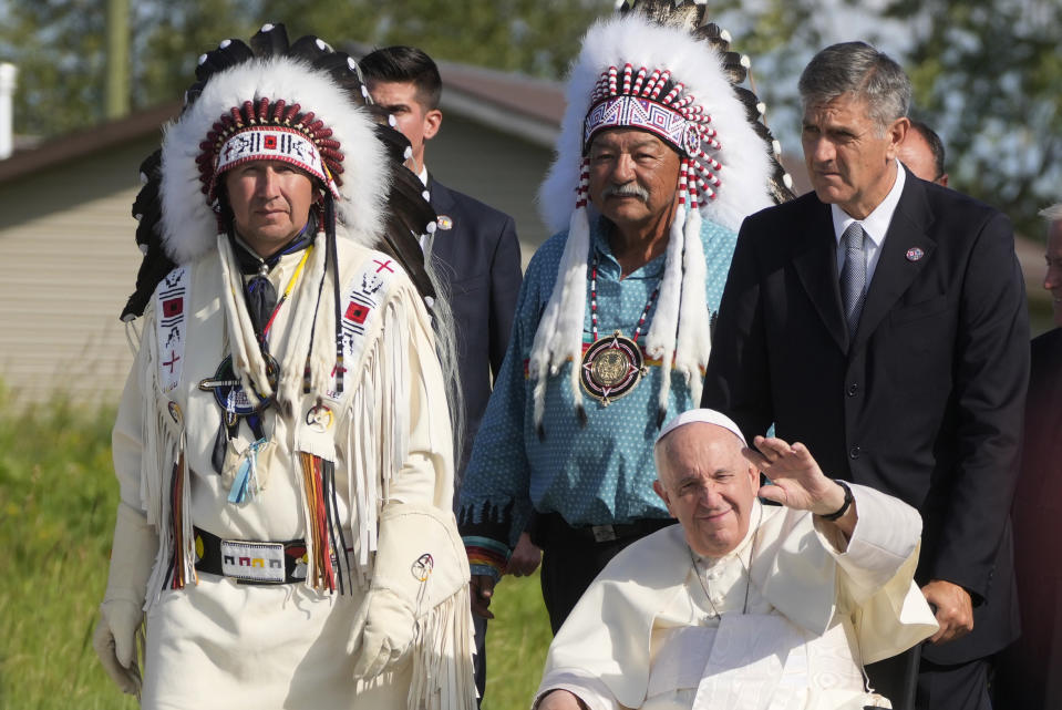 Pope Francis arrives for a pilgrimage at the Lac Saint Anne, Canada, Tuesday, July 26, 2022. Pope Francis is on a second day of a "penitential" six-day visit to Canada to beg forgiveness from survivors of the country's residential schools, where Catholic missionaries contributed to the "cultural genocide" of generations of Indigenous children by trying to stamp out their languages, cultures and traditions. (AP Photo/Gregorio Borgia)