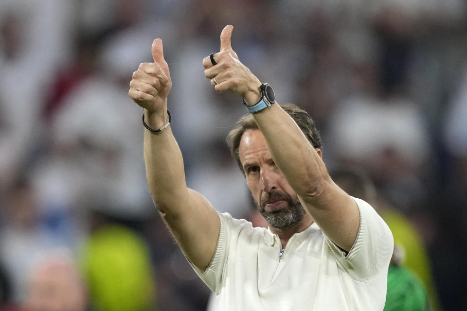 England's manager Gareth Southgate applauds fans with his teammate at the end of the round of sixteen match between England and Slovakia at the Euro 2024 soccer tournament in Gelsenkirchen, Germany, Sunday, June 30, 2024. (AP Photo/Antonio Calanni)