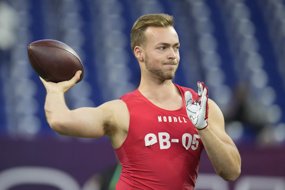 FILE - Fresno State quarterback Jake Haener runs a drill at the NFL football scouting combine in Indianapolis, Saturday, March 4, 2023. Haener bristles when asked about the obvious comparison to fellow experienced but undersized quarterback Brock Purdy. (AP Photo/Darron Cummings, File)