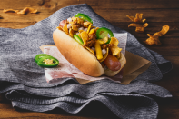 <p>The Frito-Lay Test Kitchen in Boston’s TD Garden — where the Celtics and Bruins play — is responsible for this hot dog, topped with beef chili, shredded cheddar, diced onions, sliced jalapenos and Fritos. It’s a play on Frito pie, one of <a href="https://www.thedailymeal.com/classic-texas-recipes?referrer=yahoo&category=beauty_food&include_utm=1&utm_medium=referral&utm_source=yahoo&utm_campaign=feed" rel="nofollow noopener" target="_blank" data-ylk="slk:the best Tex-Mex recipes out there;elm:context_link;itc:0;sec:content-canvas" class="link ">the best Tex-Mex recipes out there</a>.</p> <p><a href="https://www.thedailymeal.com/recipes/td-arena-fritos-chile-cheese-dog-recipe?referrer=yahoo&category=beauty_food&include_utm=1&utm_medium=referral&utm_source=yahoo&utm_campaign=feed" rel="nofollow noopener" target="_blank" data-ylk="slk:For the TD Garden Fritos Chili Cheese Dog Recipe, click here.;elm:context_link;itc:0;sec:content-canvas" class="link ">For the TD Garden Fritos Chili Cheese Dog Recipe, click here.</a></p>