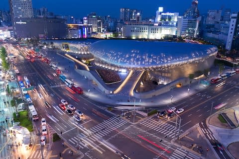 Aerial view of the Dongdaemun Design Plaza by night - Credit: Alamy