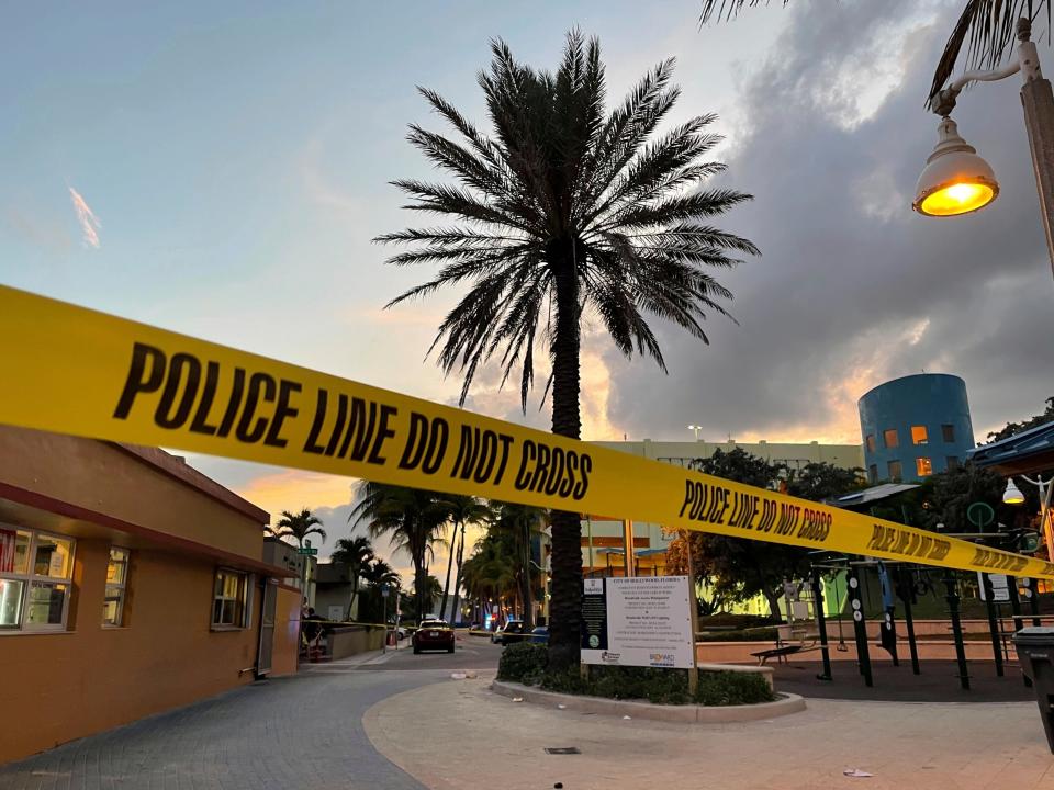 Police cordon off an area as they respond to a shooting near the Hollywood Beach Broadwalk in Hollywood, Fla., Monday evening, May 29, 2023. (Mike Stocker/South Florida Sun-Sentinel via AP) ORG XMIT: FLLAU601
