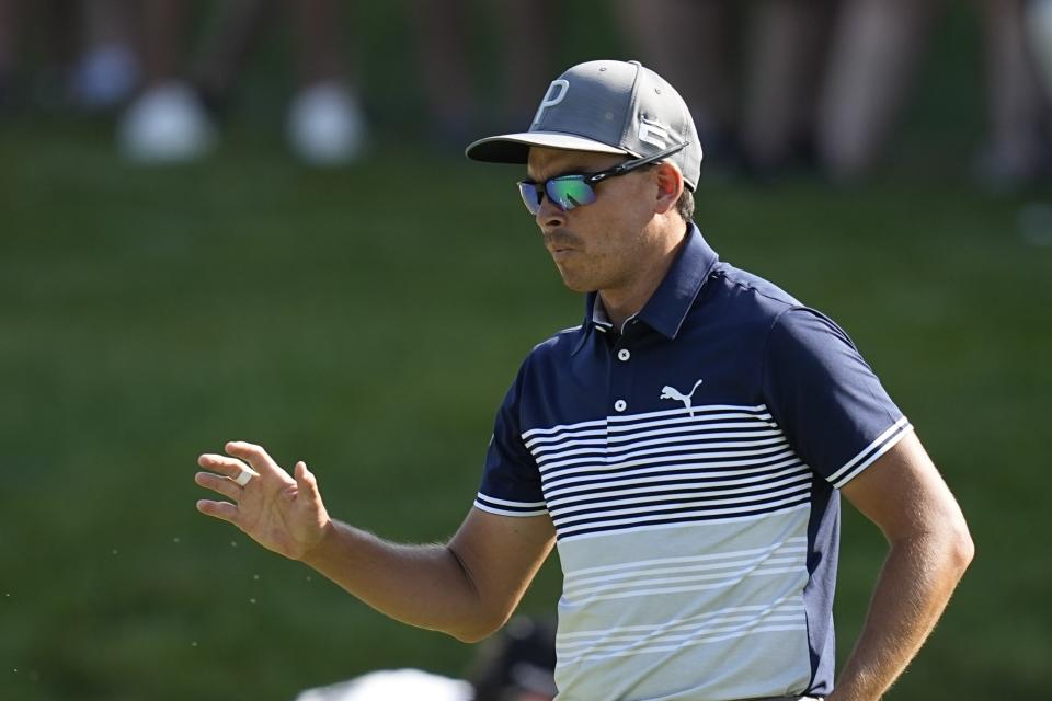 Rickie Fowler reacts after a birdie on the 14th hole during the first round of the Memorial golf tournament, Thursday, June 1, 2023, in Dublin, Ohio. (AP Photo/Darron Cummings)