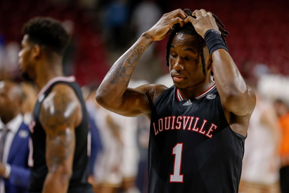 Louisville forward Mike James (1) reacts to the team's loss to Boston College in an NCAA college basketball game, Wednesday, Jan. 25, 2023, in Boston. (AP Photo/Greg M. Cooper)