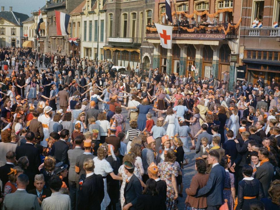 Dutch civilians dancing in the streets after the liberation of Eindhoven by Allied forces, September 1944 (Imperial War Museum )