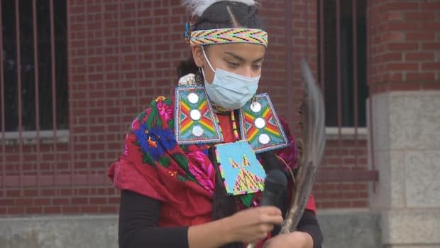 Meadow Musqua, 17, has been doing healing dances outside a Regina hospital for her kokum, Lorna Standingready, who has been diagnosed with COVID-19. (Richard Agecoutay/CBC - image credit)