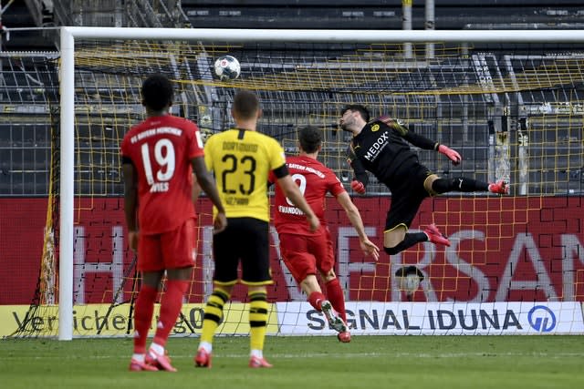 Dortmund goalkeeper Roman Burki is beaten by Joshua Kimmich