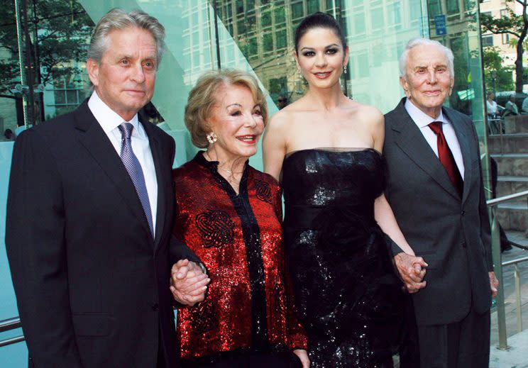 Michael Douglas, Ann Buyden Douglas, Catherine Zeta-Jones and Kirk Douglas at the 37th Annual Chaplin Award Gala. (Credit: AP Images)