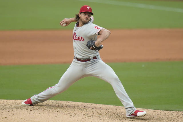 Philadelphia Phillies' Aaron Nola, right bats as his brother, San Diego  Padres catcher Austin Nola, waits for the pitch during the second inning of  a baseball game Saturday, Aug. 21, 2021, in