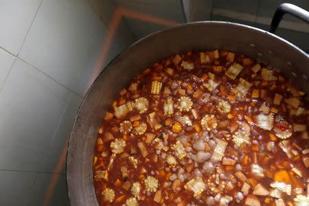 A soup for the students is pictured during an activity for the end of the school year at the Padre Jose Maria Velaz school in Caracas, Venezuela July 12, 2016. EUTERS/Carlos Jasso