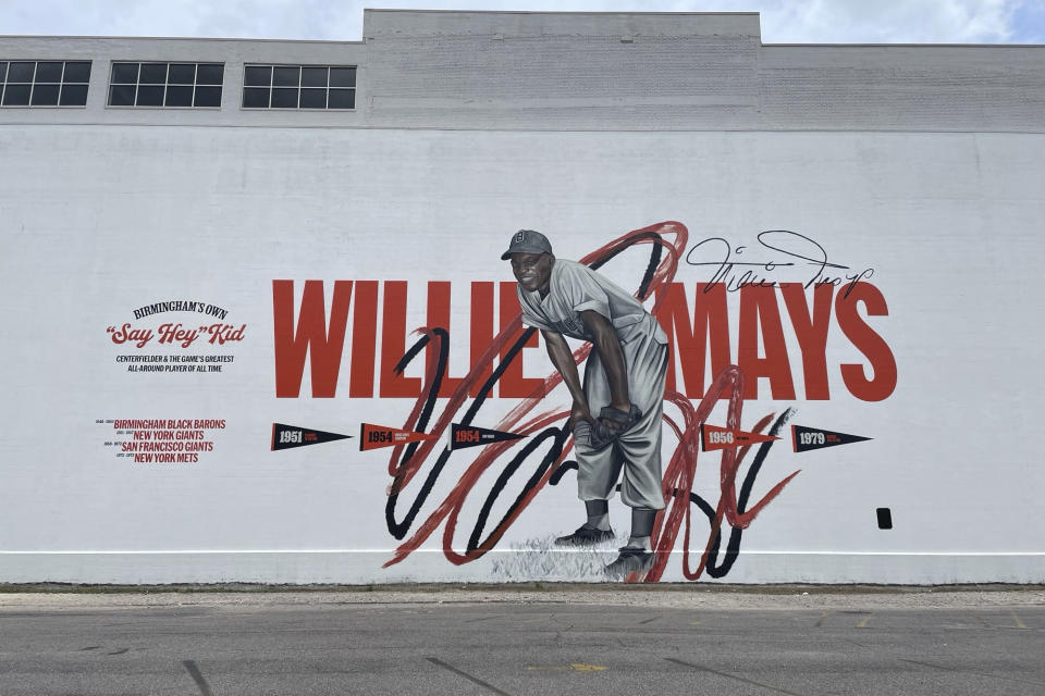 A Willie Mays mural is shown in downtown Birmingham, Ala., Wednesday, June 19, 2024. The mural was created by artist Chuck Styles and celebrates Mays' contributions to baseball, honoring the longtime Giants center fielder who died Tuesday at age 93.(AP Photo/Alanis Thames)