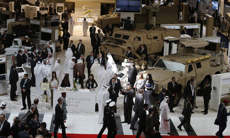 People visit during the opening of the International Defence Exhibition and Conference (IDEX) at the Abu Dhabi National Exhibition Centre in the Emirati capital on February 17, 2013. A top French defence industry official said that talks to sell Rafale jet fighters to the UAE were "progressing well", expressing confidence that a deal could be reached with the Gulf state.