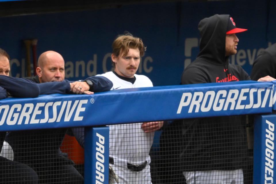 Cleveland Guardians designated hitter Kyle Manzardo (9) stands in the dugout before his first MLB at-bat in the second inning Monday against the Detroit Tigers in Cleveland.