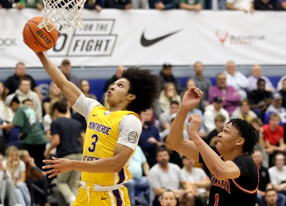 Montverde Academy’s Curtis Givens shoots in front of Wasatch Academy’s Isiah Harwell during a National Hoopfest Utah Tournament game at Pleasant Grove High School in Pleasant Grove on Monday, Nov. 20, 2023. Montverde won 88-53. | Kristin Murphy, Deseret News