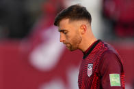 United States' Matt Turner (1) walks off the pitch following the team's loss to Canada at the end of the second half of a World Cup soccer qualifier in Hamilton, Ontario, Sunday, Jan. 30, 2022. (Frank Gunn/The Canadian Press via AP)