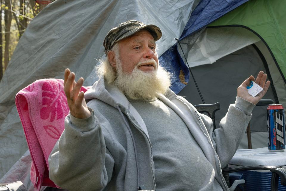 Ron Smith, who is has lived in the Neptune homeless camp for years, is happy there as long as he has food and heat and doesn’t plan on moving unless he’s kicked out. 4/19/23