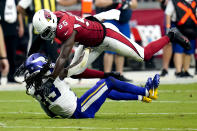 Arizona Cardinals linebacker Chandler Jones (55) hits Minnesota Vikings running back Dalvin Cook (33) during the second half of an NFL football game, Sunday, Sept. 19, 2021, in Glendale, Ariz. (AP Photo/Ross D. Franklin)