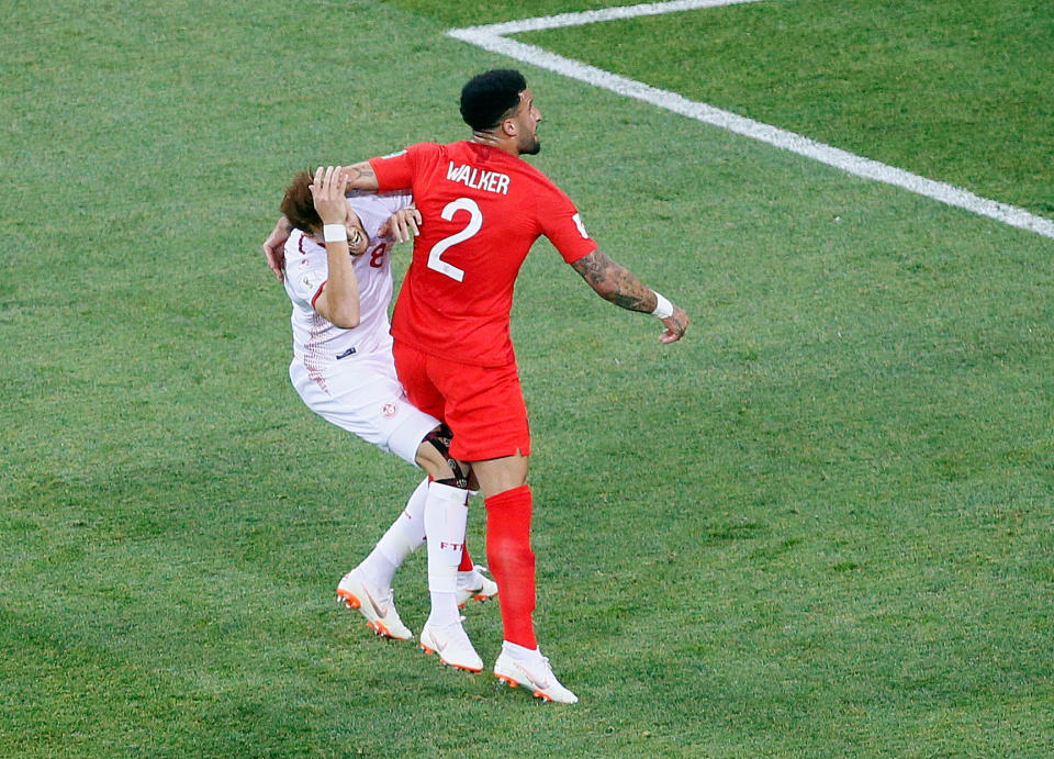 Soccer Football – World Cup – Group G – Tunisia vs England – Volgograd Arena, Volgograd, Russia – June 18, 2018 Tunisia’s Fakhreddine Ben Youssef is fouled by England’s Kyle Walker resulting in a penalty REUTERS/Gleb Garanich