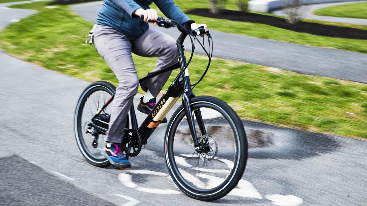 a person riding an aventon electric bike