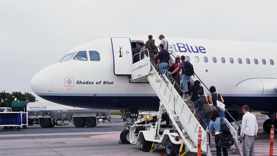 Travelers Boarding a JetBlue Flight