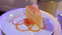 <p>Another dish that was popular because of The Brown Derby association was the Grapefruit Cake. Made with vanilla sponge cake, grapefruit syrup, grapefruit cheesecake, and grapefruit jam, this dish's popularity spiked super high at Disney. </p>