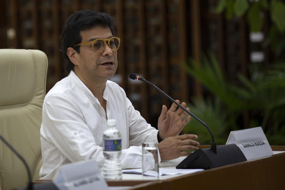 Colombian Peace Commissioner Danilo Rueda attends a meeting with representatives of the Colombian guerrilla National Liberation Army (ELN) in Havana, Cuba, Friday, Aug. 12, 2022. The delegations of the Colombian government and the guerrilla National Liberation Army announced on Friday that they are committed to taking the necessary steps to try to reactivate the peace negotiations suspended four years ago. (AP Photo/Ismael Francisco)