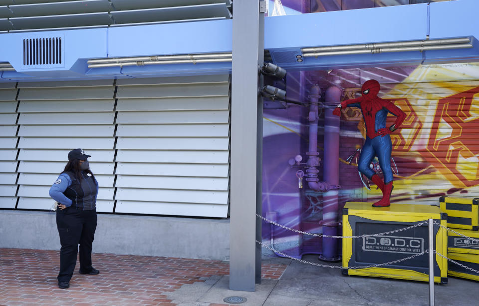 Cast Member Angelica Patterson speaks with a Spider-Man character following "The Amazing Spider-Man!" show at the Avengers Campus media preview at Disney's California Adventure Park on Wednesday, June 2, 2021, in Anaheim, Calif. (AP Photo/Chris Pizzello)