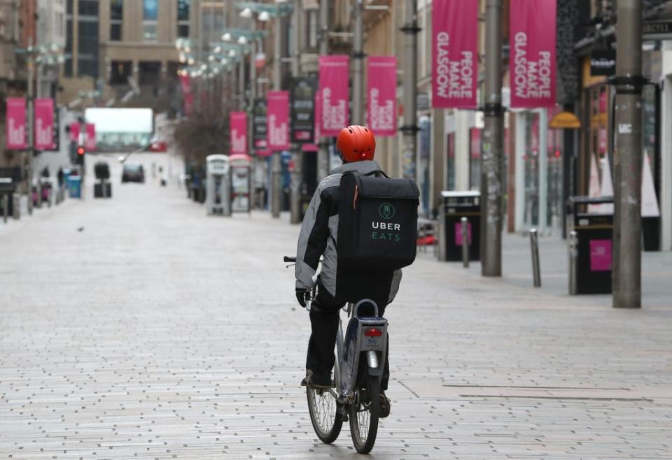 Uber Eats couriers will start delivering Tesco food for the supermarket (Andrew Milligan/PA) (PA Archive)