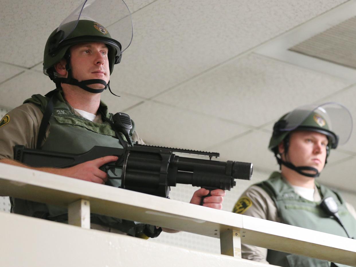 Los Angeles County sheriff's deputies keep watch in a chapel at Men's Central Jail on December 25, 2019. (Mario Tama:Getty Images)