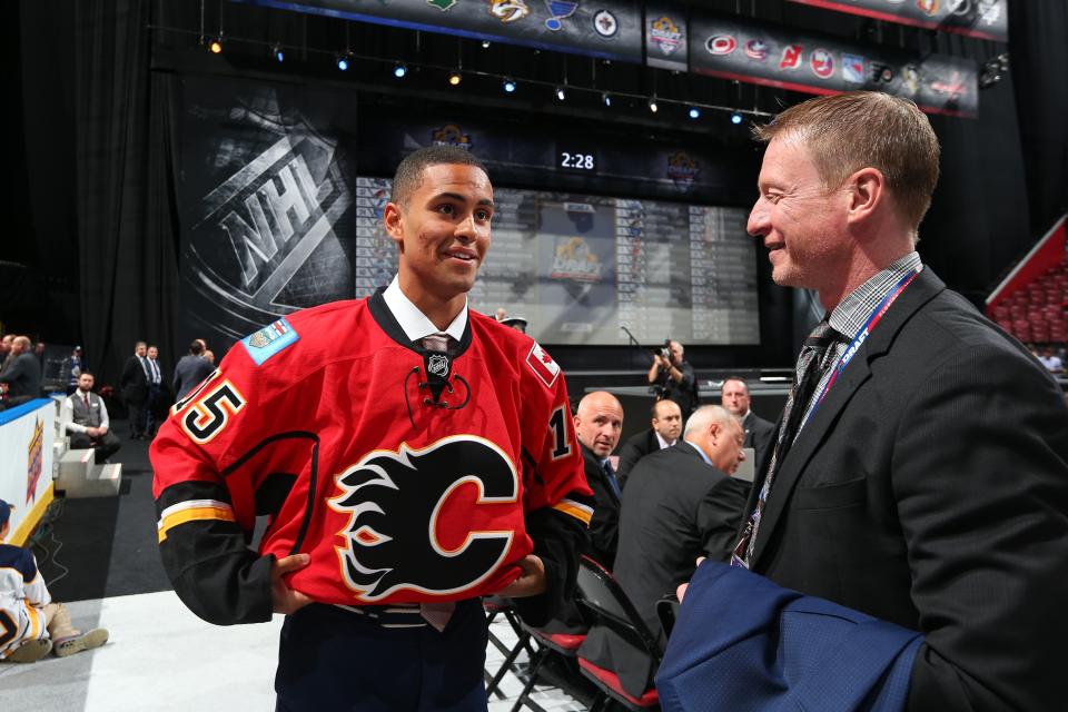 Oliver Kylington reacts after being selected 60th overall by the Calgary Flames during the 2015 NHL Draft.  (Photo by Bruce Bennett/Getty Images)