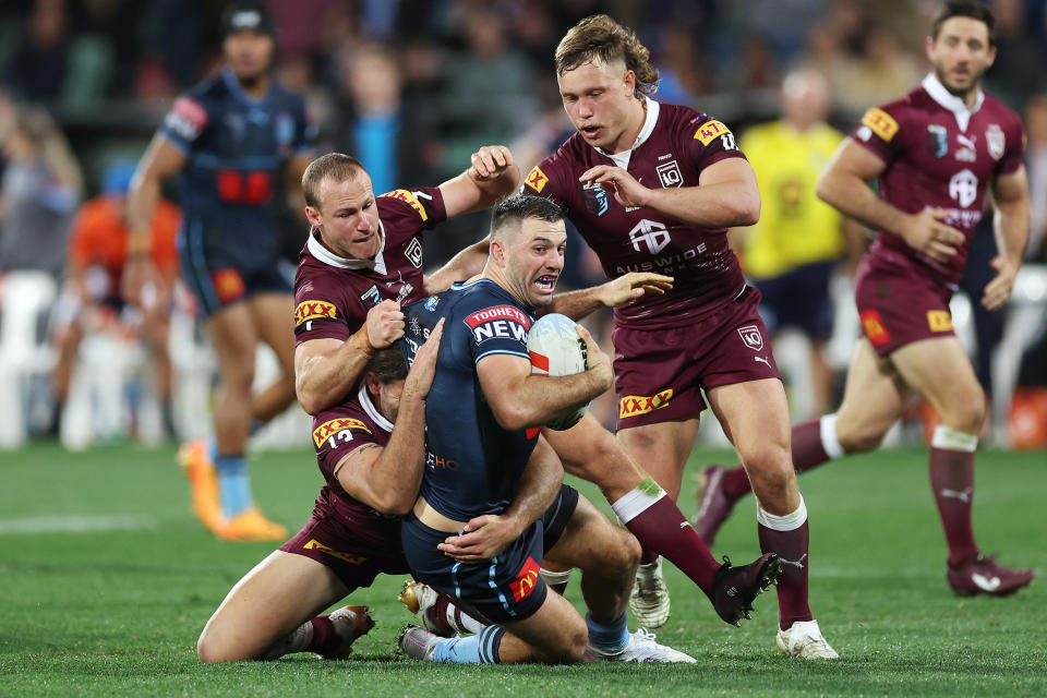 ADELAIDE, AUSTRALIA - MAY 31:  James Tedesco of the Blues is tackled during game one of the 2023 State of Origin series between the Queensland Maroons and New South Wales Blues at Adelaide Oval on May 31, 2023 in Adelaide, Australia. (Photo by Mark Kolbe/Getty Images)